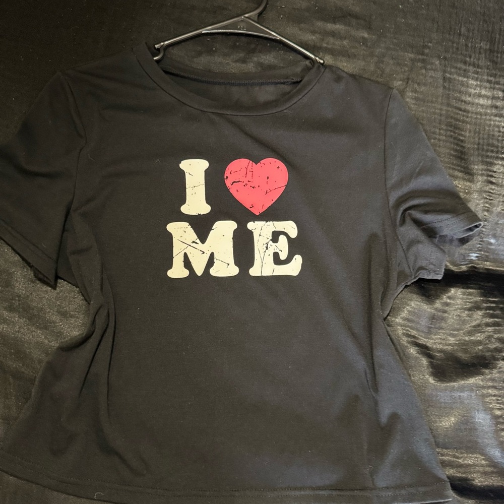 Black T-Shirt with Red Heart Graphic